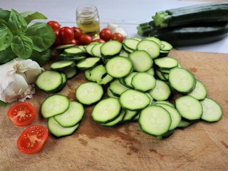 courgettes sliced with cherry and herbs