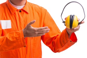 Construction worker with noise cancelling earphones