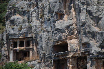 Fototapeta na wymiar Ancient city carved into the rock in Turkey near Antalya