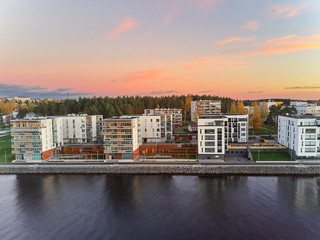 Obraz premium Aerial view of new district and the embankment of Pielisjoki river