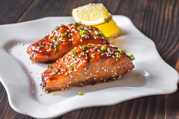 Teriyaki salmon on the white plate