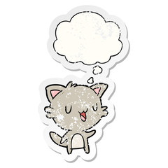 cartoon happy cat and thought bubble as a distressed worn sticker
