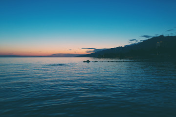 Obraz premium Sea and sky with clouds at sunset.