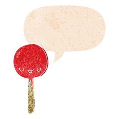 cartoon candy lollipop and speech bubble in retro textured style