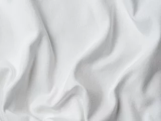 Tuinposter Witte katoenen stof textuur. Kleding katoen jersey achtergrond met plooien © fascinadora