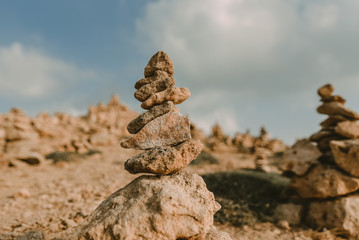 Seashore background with stone tower.