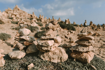Seashore background with stone tower.