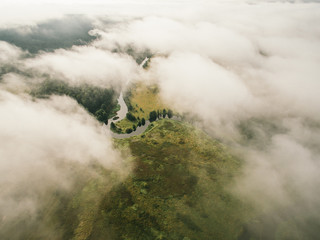 Aerial view the river during summer day under the great clouds.