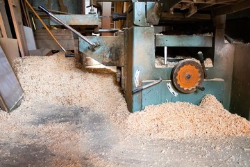 Fototapeta premium Old woodworking machinery on natural light. Traditional art.