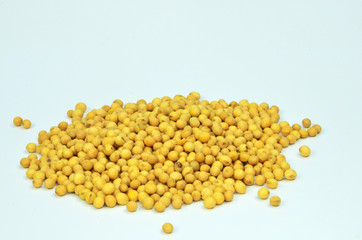 View about soy beans pile on white background