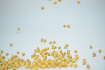 View about soy beans pile on white background