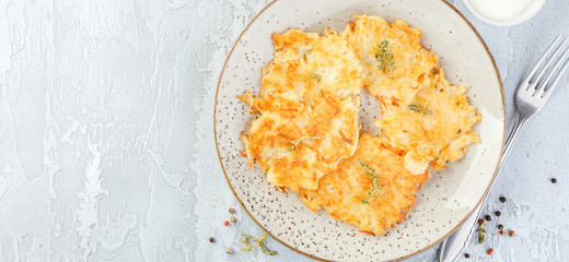 Pan-fried potato pancakes - rosti, kartoffelpuffer, latkes, draniki, hash browns