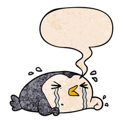 cartoon crying penguin and speech bubble in retro texture style