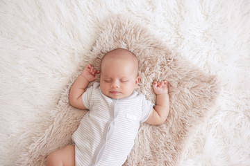 newborn boy is sleeping - obrazy, fototapety, plakaty