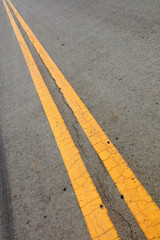 Fototapeta premium Yellow double solid line