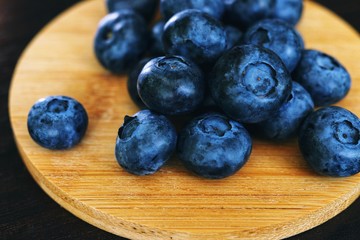 blueberries on bamboo plate close up