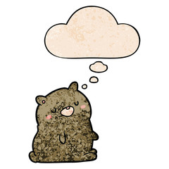 cartoon bear and thought bubble in grunge texture pattern style