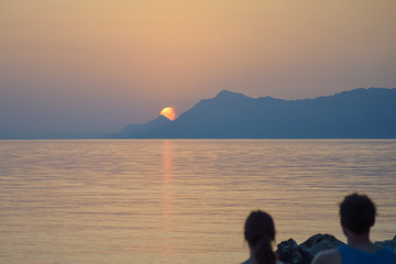 Sunset on Adriatic sea in Makarska, Croatia 