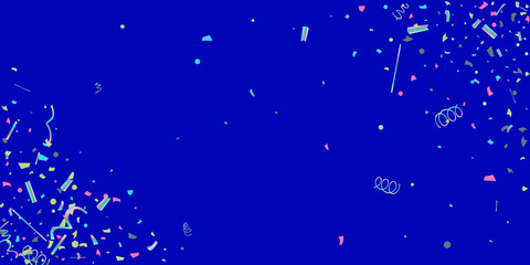 Colorful colored confetti on a blue background.
