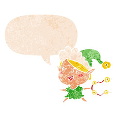 cartoon happy christmas elf and speech bubble in retro textured style
