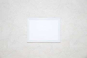 empty frame on the wall