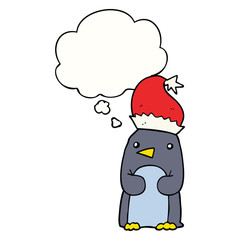 cute christmas penguin and thought bubble