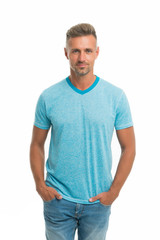 Fototapeta premium Adding some personality with the right style. Handsome man with unshaven face and iconic hair style. Caucasian guy wearing casual summer style. His haircut and style work really well