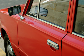 detail of red vintage car, 80s