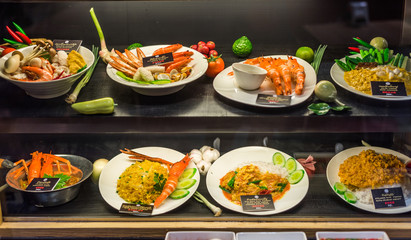 Decorated Food Samples with Prices in a Restaurant in Thailand