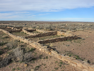 The Puerco Pueblo. The homes of the people who once lived in this inhospitable area. The structures are single room with no door. The people living in these houses probably entered their homes through