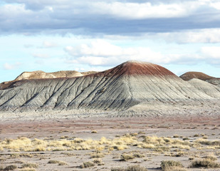 The tepees or the distinctive cone-shaped rock structures of the Blue Mesa section of the park.. The structures sculpted by water and wind erosion characterize the Blue Mesa.erosion
