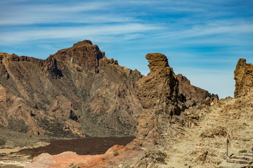 Fototapeta premium Famous view of Pregnant Bear Mountain near volcano Teide on Tenerife. Beautiful landscape in the national park on Tenerife with the famous rock, Cinchado, Los Roques de Garcia in the scene