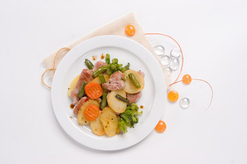 Homemade slice steak with boiled broccoli and carrot,roasted potato. Top view or flat lay. 