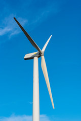 The wind turbine power working, blue sky, energy power concept
