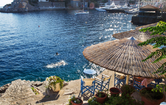 People  swimming . Hydra greek   island. Majestic  day