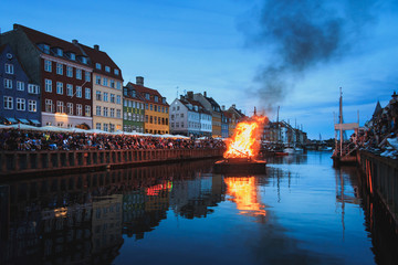 Burning The witch on bonfire the middle of Nyhavn canal during Sankthans evning