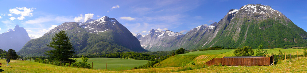 Fototapeta na wymiar Mountains panorama from Mjelva Camping near Andalsnes, Norway.