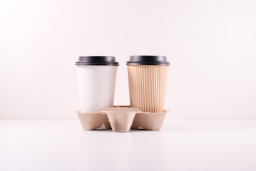 biodegradable coffee container in paper tray for take away eco friendly.