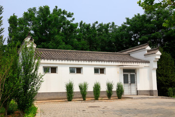 Grey tiles and white walls built in the park