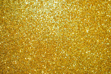 Golden Glitter texture colorful abstract background for birthday, anniversary, wedding, new year or Christmas.