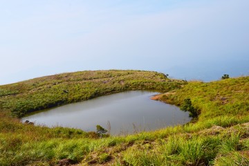 Fototapeta premium beautiful heart shaped lake in the top of hill located ind india