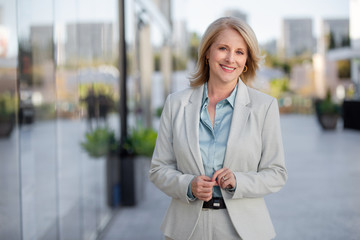 Candid portrait of a joyful cheerful happy business CEO, employee, staff member, leader, executive...