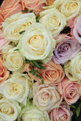 Obraz na płótnie Canvas Pastel roses in a wedding arrangement