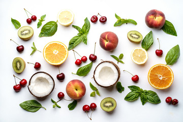 Summer fruity composition. Layout made of delicious ripe fruits on white background. Summertime, healthy food, delicious sweet dessert