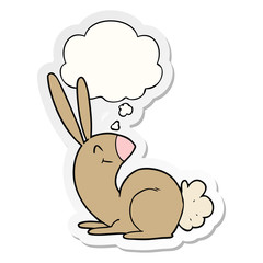 cute cartoon rabbit and thought bubble as a printed sticker