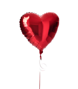 Single red heart balloon object for birthday party or valentines day isolated on a white 