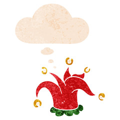 cartoon jester hat and thought bubble in retro textured style