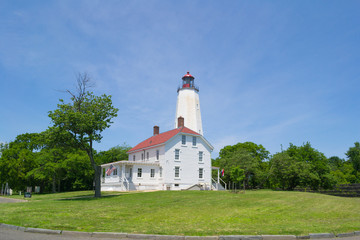 Fototapeta na wymiar Sandy Hook Lighthouse and tower at the Jersey Shore. NJ, USA.