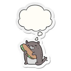 cartoon cat with sandwich and thought bubble as a printed sticker