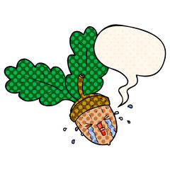 cartoon crying acorn and speech bubble in comic book style